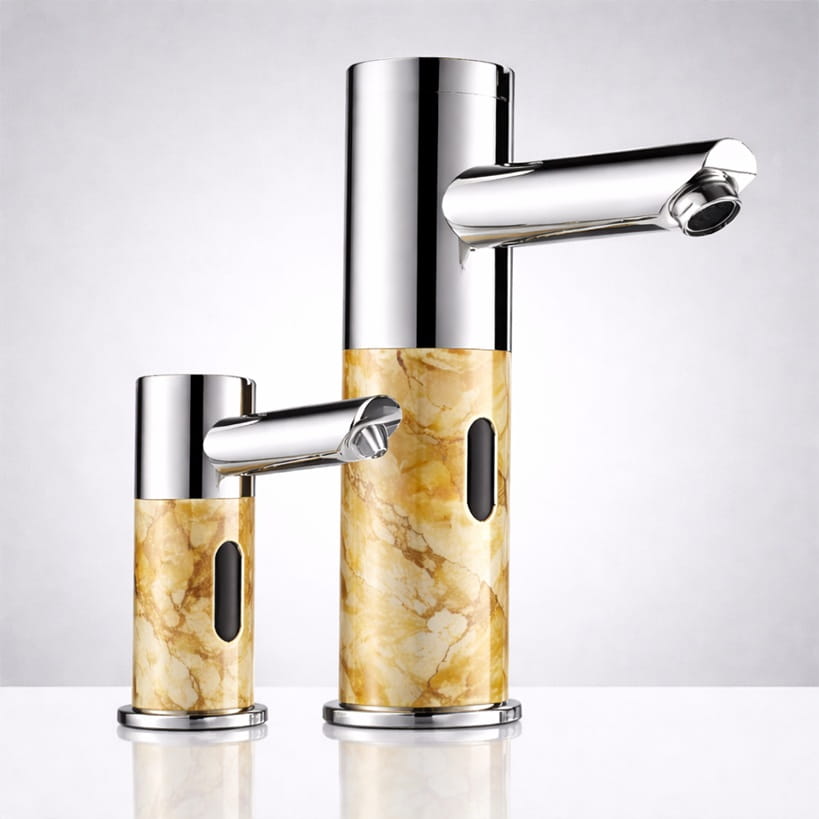 Premium hotel restroom featuring modern touchless sink fixtures